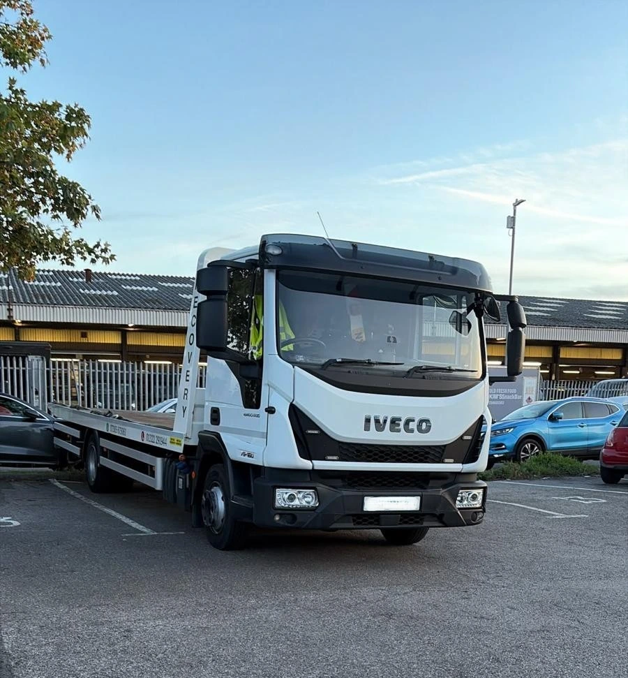 AIL Recovery’s real white Iveco Eurocargo recovery truck, photographed from the front at the yard